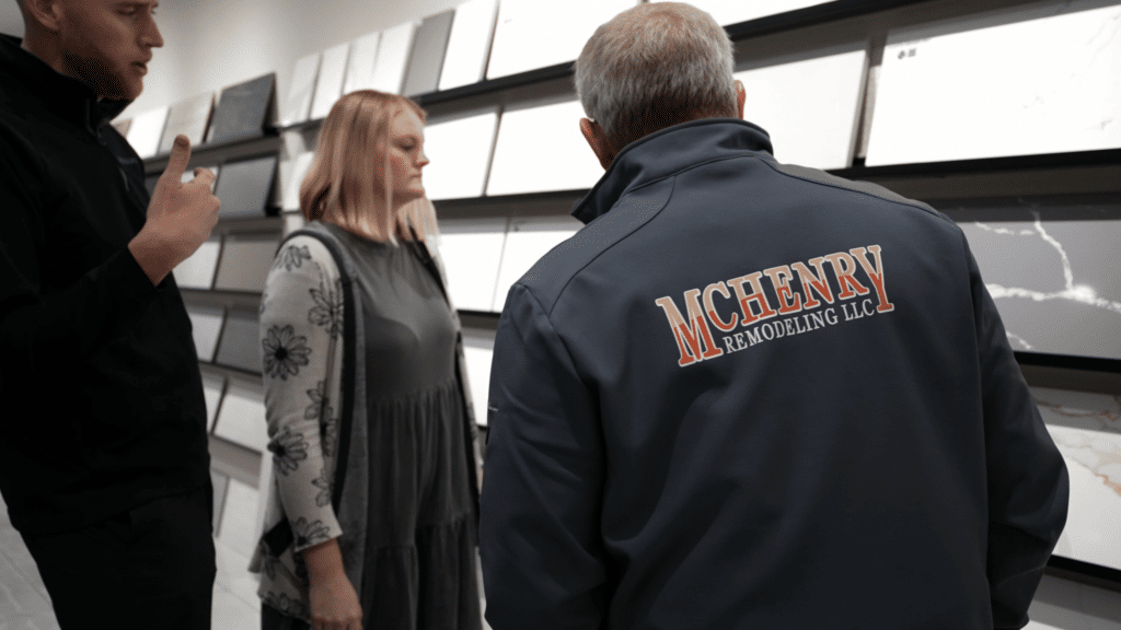 McHenry Remodeling showing customers interior remodeling materials in showroom